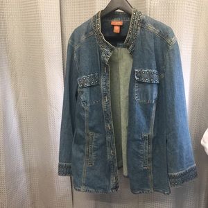 Medium length jean jacket with Worn gold embellishments